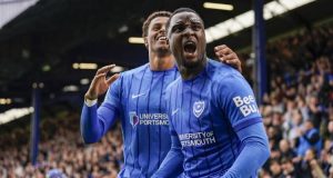 Portsmouth players celebrating, with Santacatarinas Sports overlay